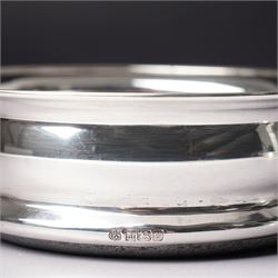 Pair of silver bottle coasters with turned wooden bases D13.5cm Birmingham 1969 Maker Barker Bros.Silver Ltd 