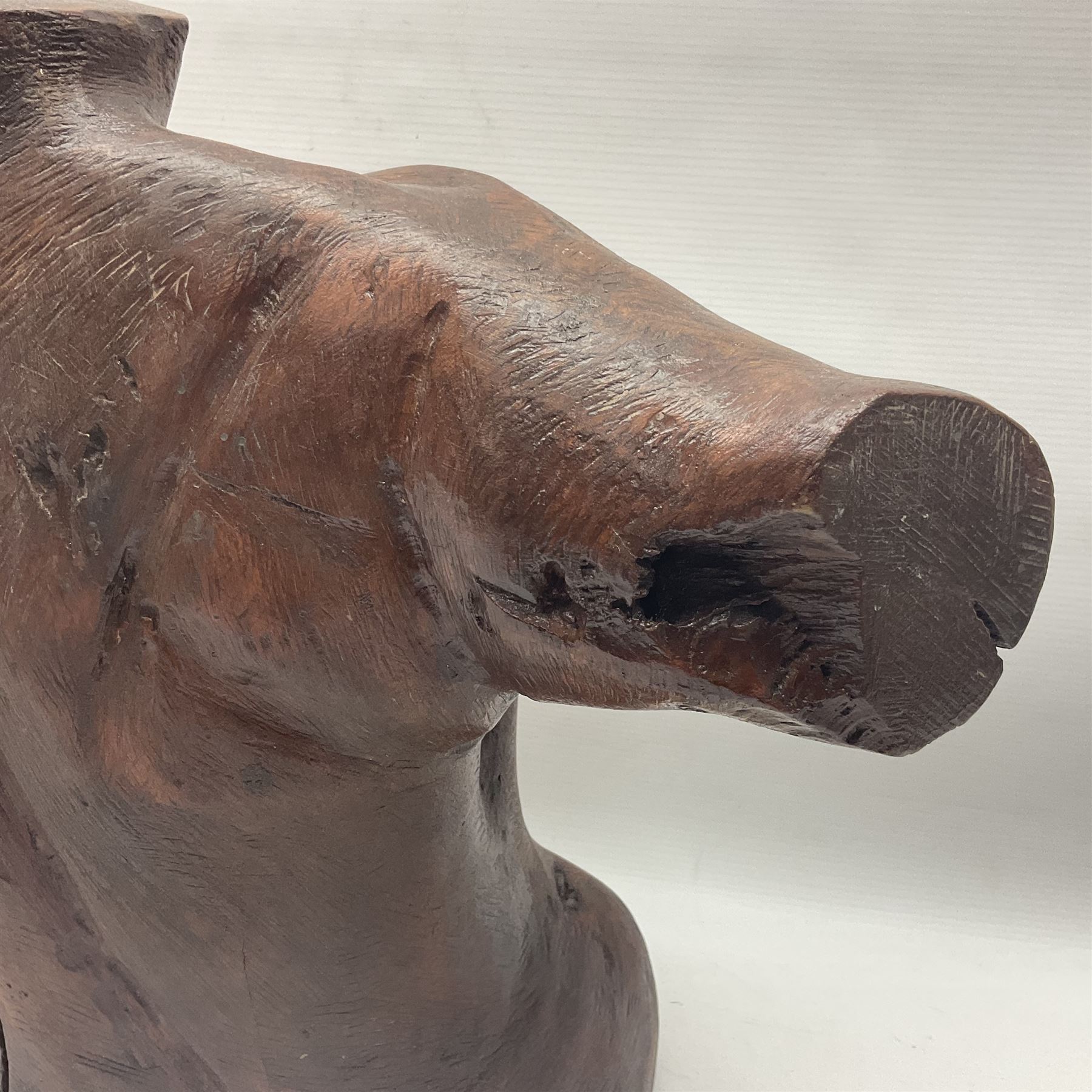 Helen Skelton (British 1933 – 2023): Large carved wooden sculpture, modelled as a male torso, H40cm. Born into an RAF family in 1933 in Kent and travelled the world extensively during her childhood. After settling in Bridlington, Helen immersed herself in painting, textiles, and wood sculpture, often inspired by nature's beauty. Her talent was showcased in a one-woman show at Sewerby Hall and recognised with the sculpture prize at Ferens Art Gallery in 2000. Sadly, Helen’s daughter passed away from cancer in 2005. This loss inspired Helen to donate her sculptures to Marie Curie upon her passing in 2023.