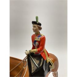 A Beswick model of HM Queen Elizabeth II mounted on Imperial Trooping the colour 1957, model no 1546, H26.5cm.