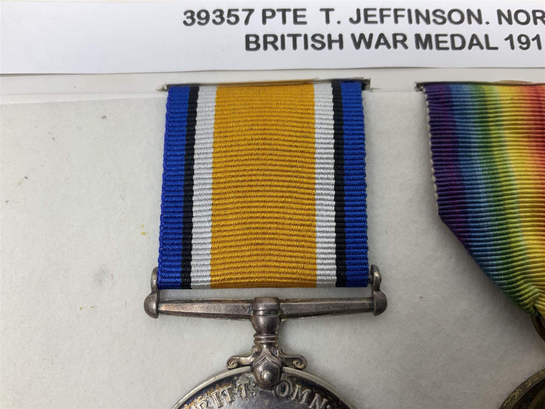 WWI pair of medals comprising British War Medal and Victory Medal awarded to 39357 Pte. T. Jeffinson Northumberland Fusiliers; both with ribbons (2)