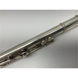 Boosey & Hawkes London Regent three-piece flute, serial no.345447; in B&H Bandhite hard carrying case; and Deg Music Company Inc. USA Claudel Model three-piece flute, serial no.491718, in hard carrying case (2)