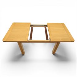 Modern oak extendable table and four chairs, extending top with stowable leaf (Extends to 152cm), chairs with brown upholstery and tapered square legs