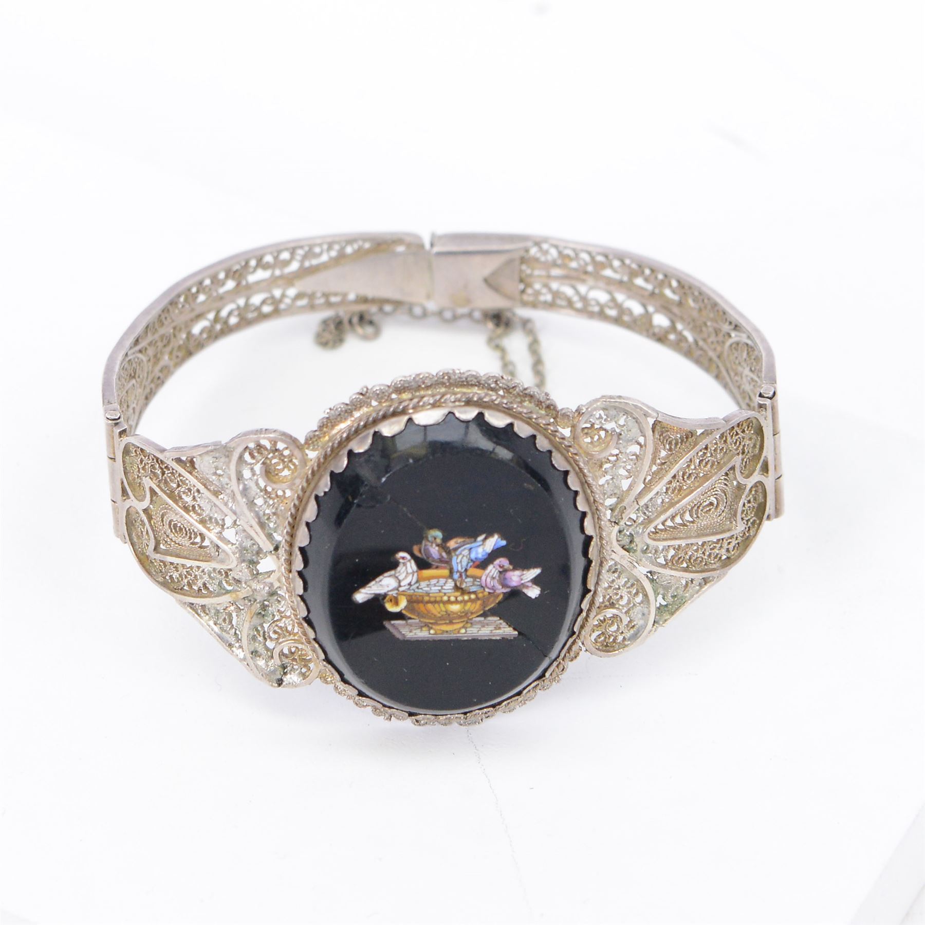 Micro mosaic Doves of Pliny bracelet, within a silver filigree band, together with a micro mosaic dove of peace brooch encased in 18ct gold mount and three other brooches 