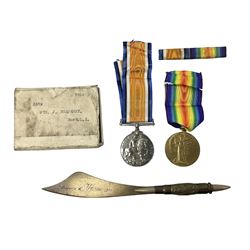 WW1 pair of medals comprising British War Medal and Victory Medal awarded to 3389 Pte. J. Humphrey Durh.L.I. with issue box, envelopes and ribbon bar; and WW1 trench art paper knife inscribed Ypres 1918