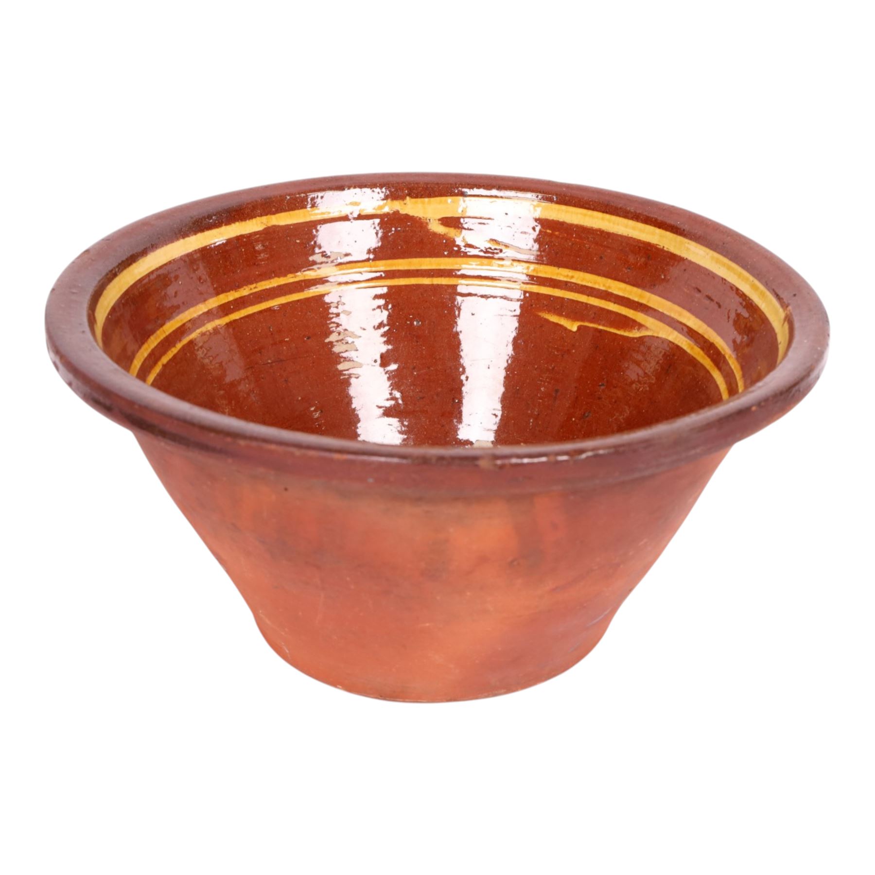 19th century terracotta bread pancheon, of circular form, the glazed interior with slip decoration, H21cm, D43cm