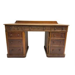 Late 19th century mahogany twin pedestal desk, raised back, fitted with nine graduating drawers