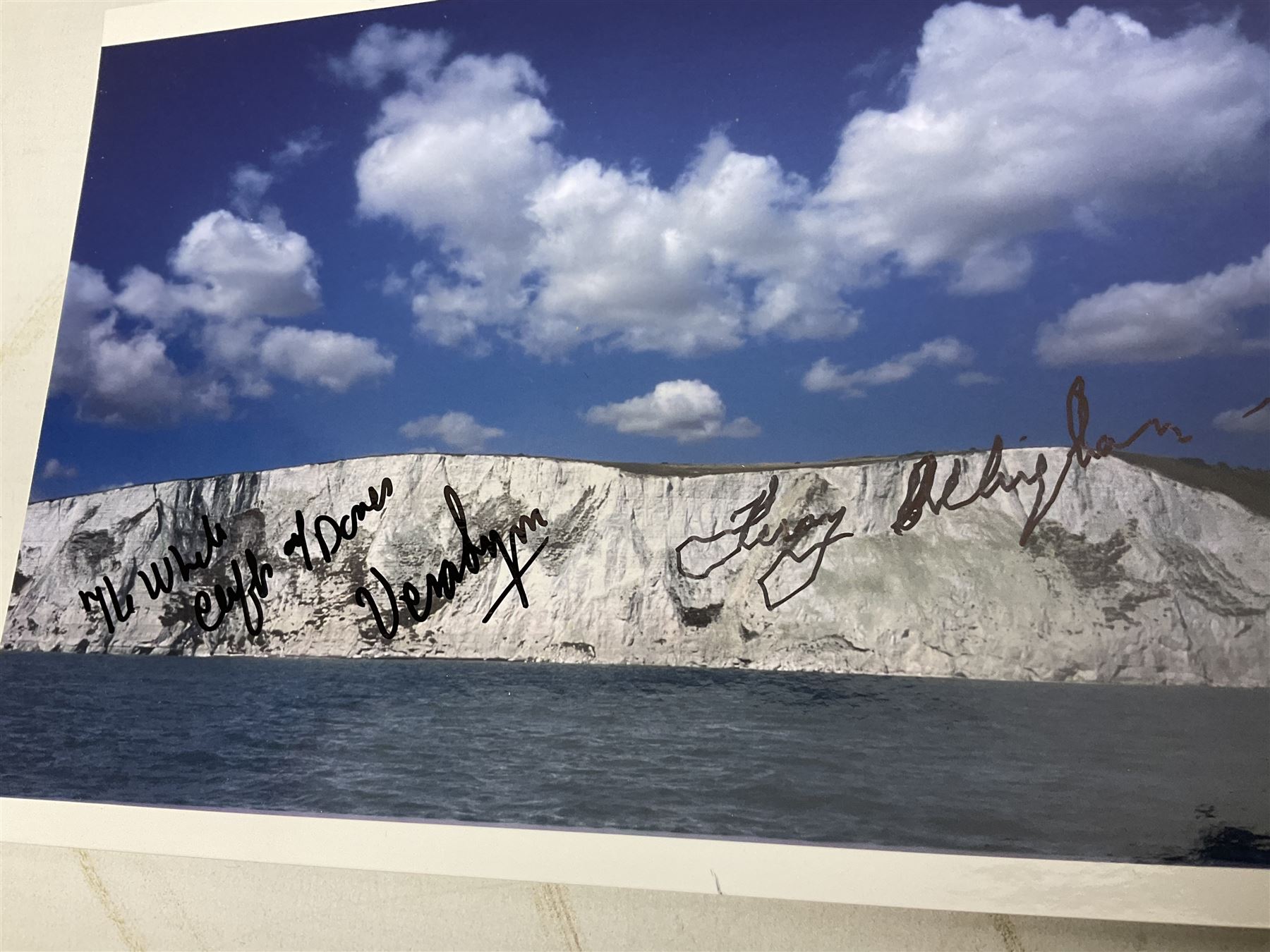 Dame Vera Lynn - collection of six signatures comprising TLS, album page and four colour photographs (including White Cliffs of Dover); signed photograph of John Mills; and signed photographs of film stars each with CoA including Bob Hope, Charlton Heston, Gene Autry, Sound of Music Julie Andrews and Christopher Plummer and Joanna Lumley