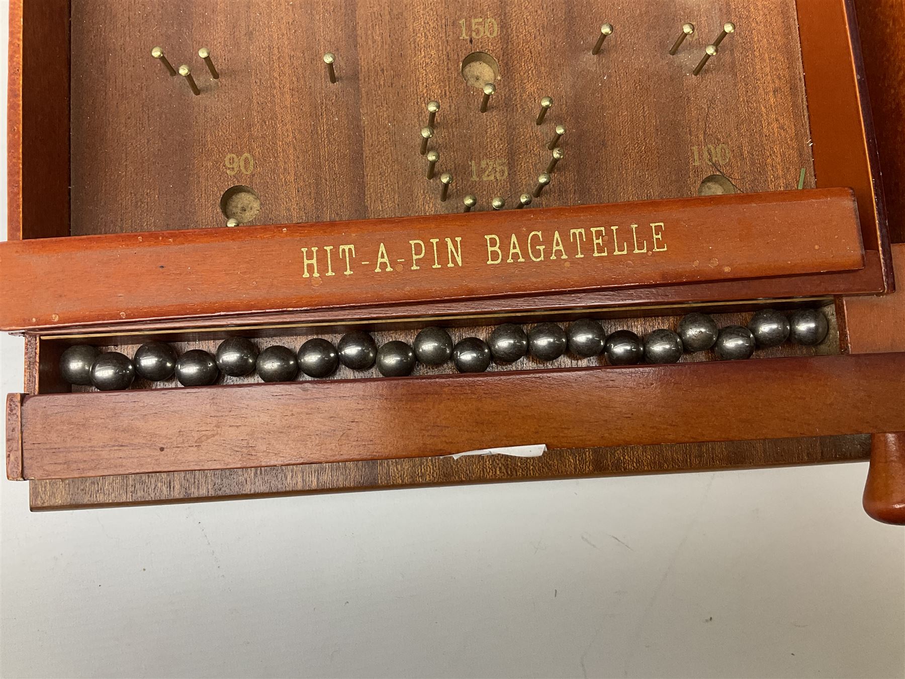 Bagatelle board and Harrods backgammon set in case