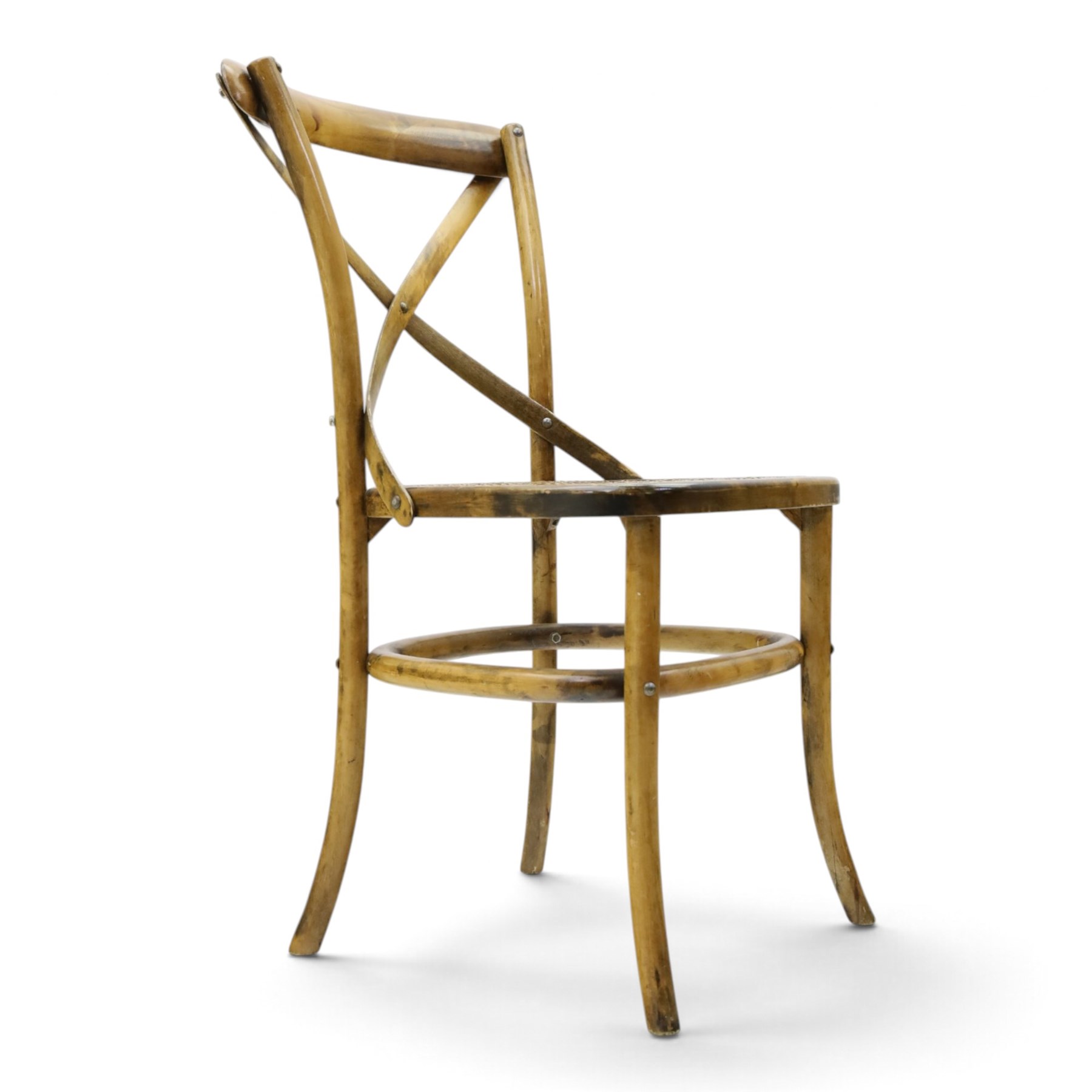 Set of four Oka style rattan dining chairs, bentwood frames inset rattan seat