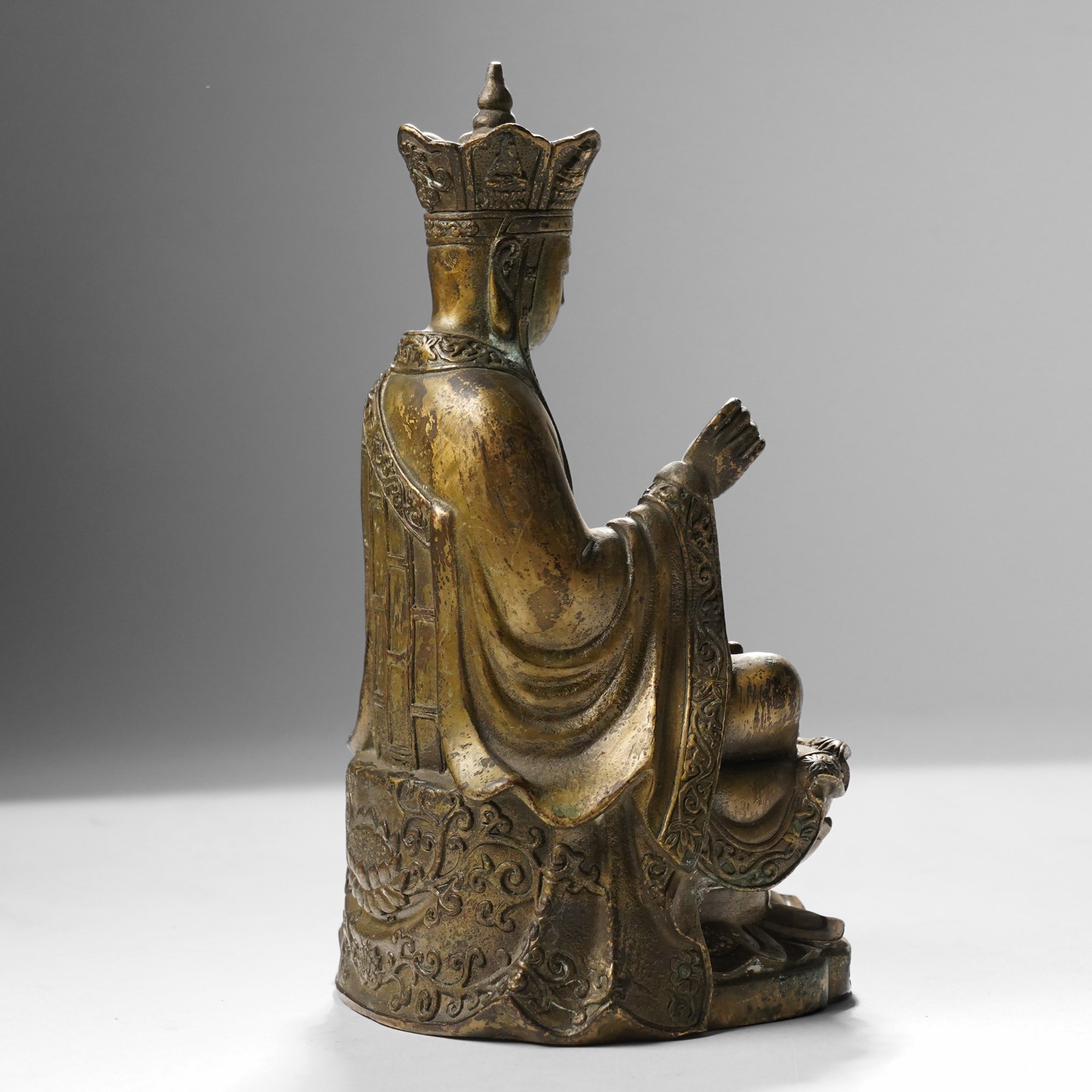 Chinese cast bronze figure of Ksitigarbha, wearing a five-pointed crown and monastic robes, H19.5cm