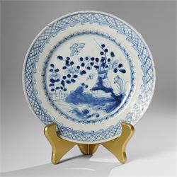 Three Chinese Kangxi period blue and white plates, painted in underglaze blue with various patterns, including Butterfly and Rockery, Pagoda and River Landscape, and floral sprays, each approx. D23cm (3)