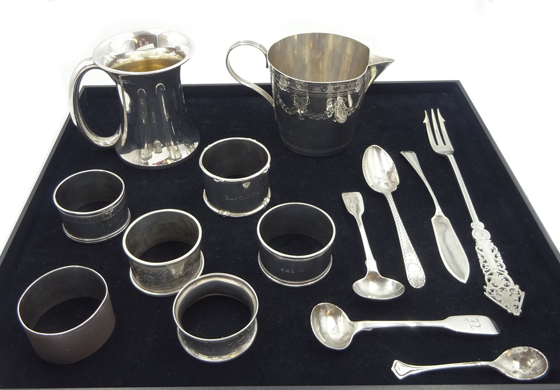 Edwardian silver christening mug by George Nathan & Ridley Hayes, Chester 1909, two silver mustard spoons markers mark P.W, Dublin 1846, six silver napkin rings, silver pierced and engraved picking fork and other flatware, all hallmarked, approx 13.8oz