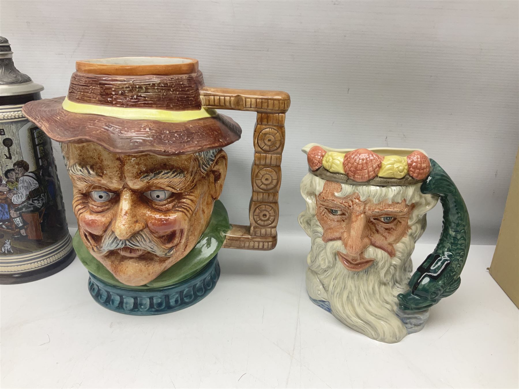 Collection of toby jugs and character jugs, to include Royal Doulton Winston Churchill and Neptune, together with Staffordshire Character Jugs examples  