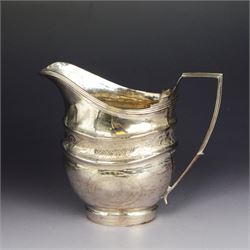 George III provincial silver helmet shaped jug, with engraved decoration and monogram to b...