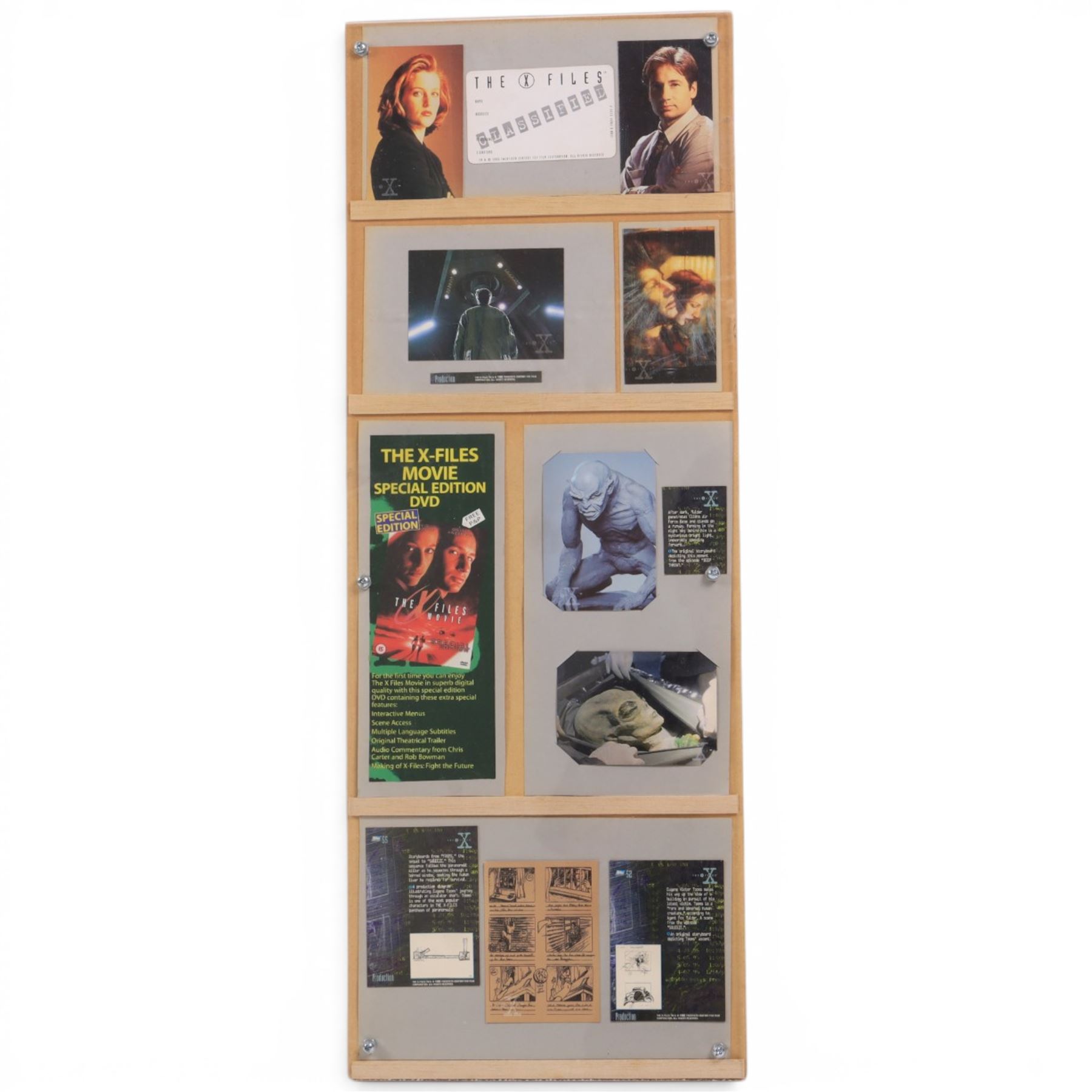 The X Files montage, including cast images, stills and advertisements, within acrylic frame, together with a Judge Dredd montage, including comic cover and comic strips, largest 46x61cm

Notes: This item is from the private collection of Arthur C. Clarke's brother.