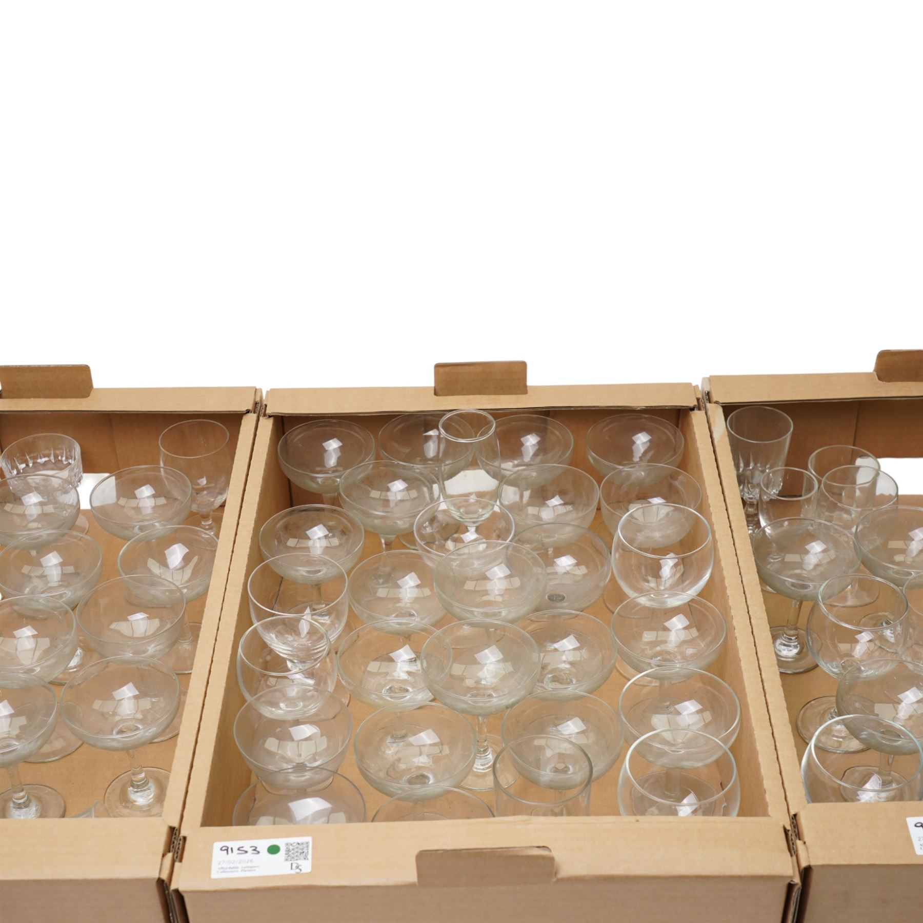 Quantity of table glass including champagne saucers, wine glasses etc