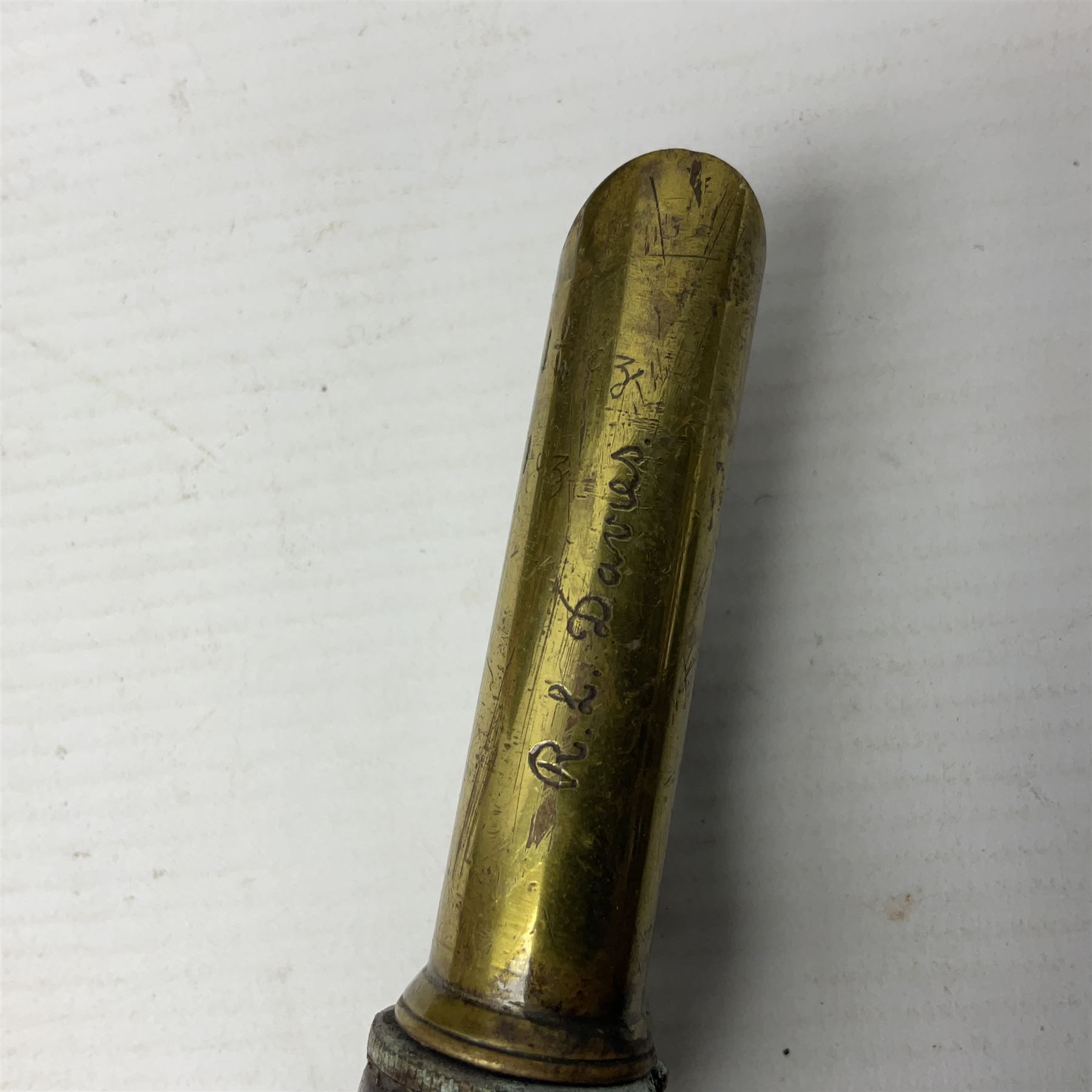 Two leather shot flasks with embossed decoration and brass nozzles; scissor action bullet mould with two ladles; pair of 19th century J.B. Warrilow hammer actions; small quantity of Staybrite buttons; and 1968 dated metal ammunition tin for 200 x 7.62 blank cartridges