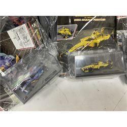 Panini Formula 1 The Car Collection - twelve die-cast models including ten in unopened packaging with periodical; all models in plastic display boxes; and eight other boxed die-cast models of racing cars by Corgi, Onyx, Classico, Minichamps etc (20)