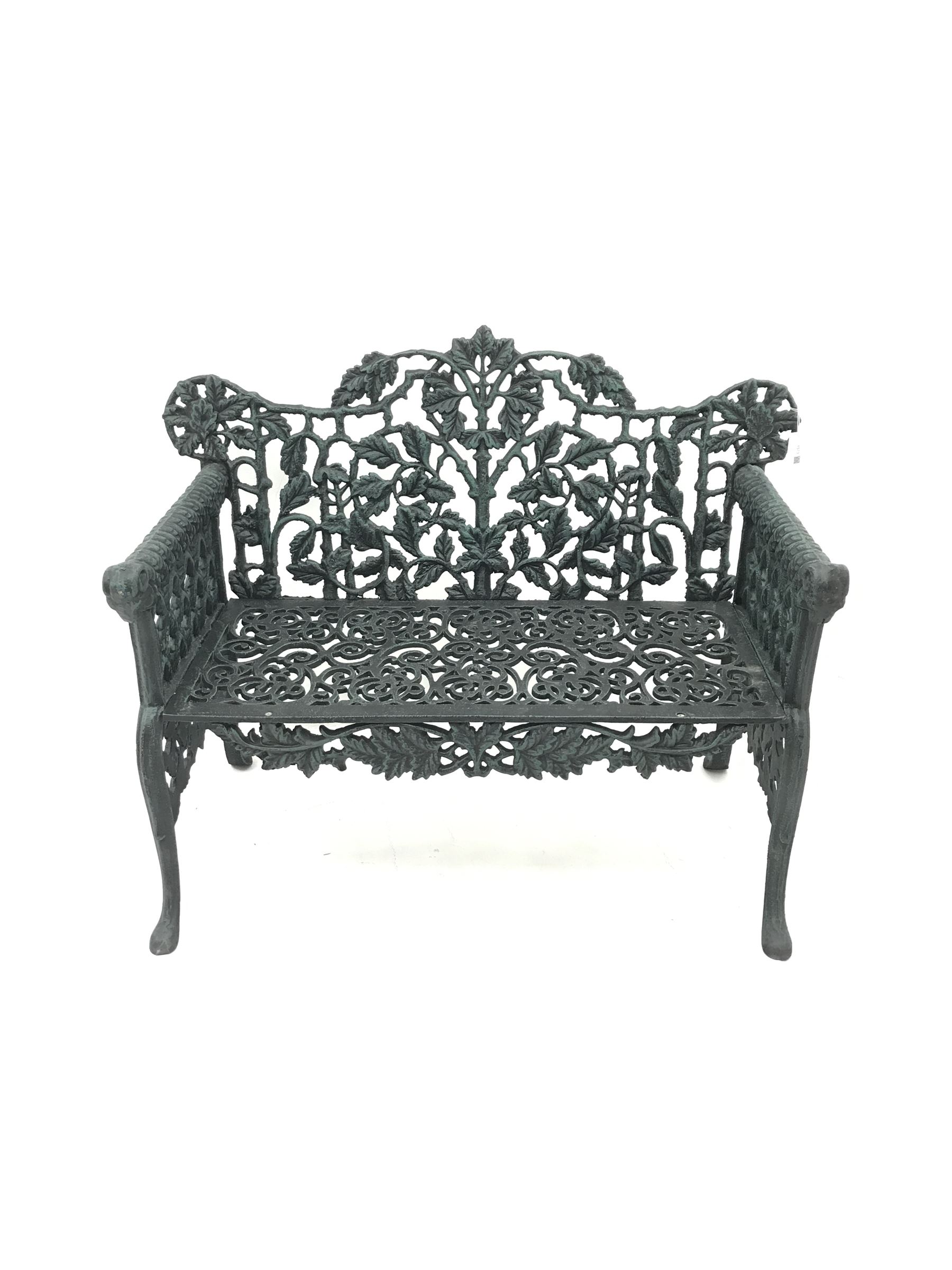 Pair Victorian style cast iron garden benches, ornate interlacing foliage and shaped back, scroll work seat, the leaf moulded arms with rams head terminals, shaped and splayed supports

Location: Duggleby Storage, Scarborough Business Park YO11 3TX