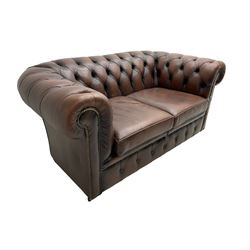 Chesterfield two seat sofa, upholstered in brown buttoned leather