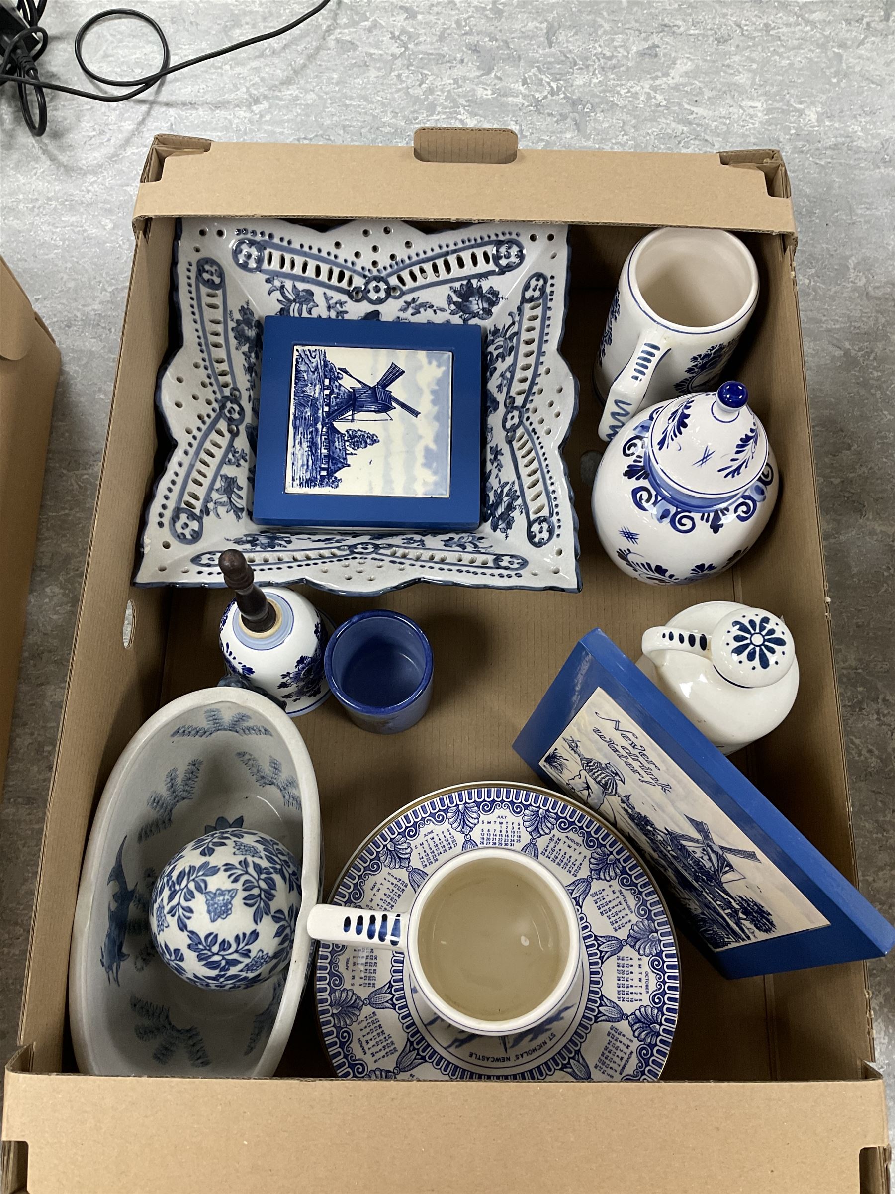 Collection of Japanese Kutani Eggshell tea service components, together with a large collection of blue and white ceramics including Heineken Delft Blue hand-painted tankard, Royal Goedewaagen Blue Delft decanter bottle and Elesva Holland jar