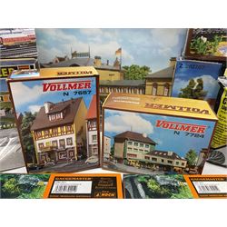 'N' gauge trackside accessories - seven Faller buildings and bridges etc Nos.N212113, N222121, N222583, N222174, N222128, Z282730 & Z282707; two others by Vollmer Nos.N7657 & N7724; four boxes of Gaugemaster Ballasted Underlay; grit and Foliage Clusters