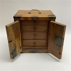 Victorian yew table top cabinet, with brass mounts and carry handle, the twin hinged doors opening to reveal a four drawer interior, H22.5cm W21cm D15.5cm