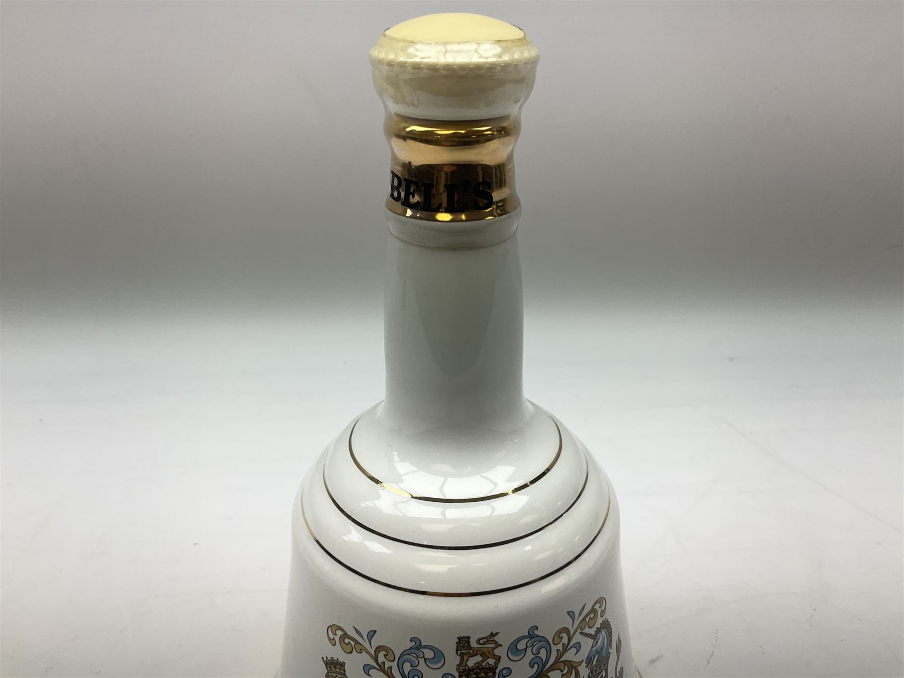 The Glenturret malt liqueur, 70cl, 35%vol and a Bell's Scotch Whisky decanter commemorating The marriage of Prince Andrew with Miss Sarah Ferguson 23rd July 1986, 75cl (2)