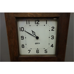  Gents' of Leicester oak cased electric master clock with pendulum, enclosed by glazed door, Arabic dial, H129cm   