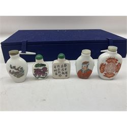 Ten modern Oriental scent bottles within a display case
