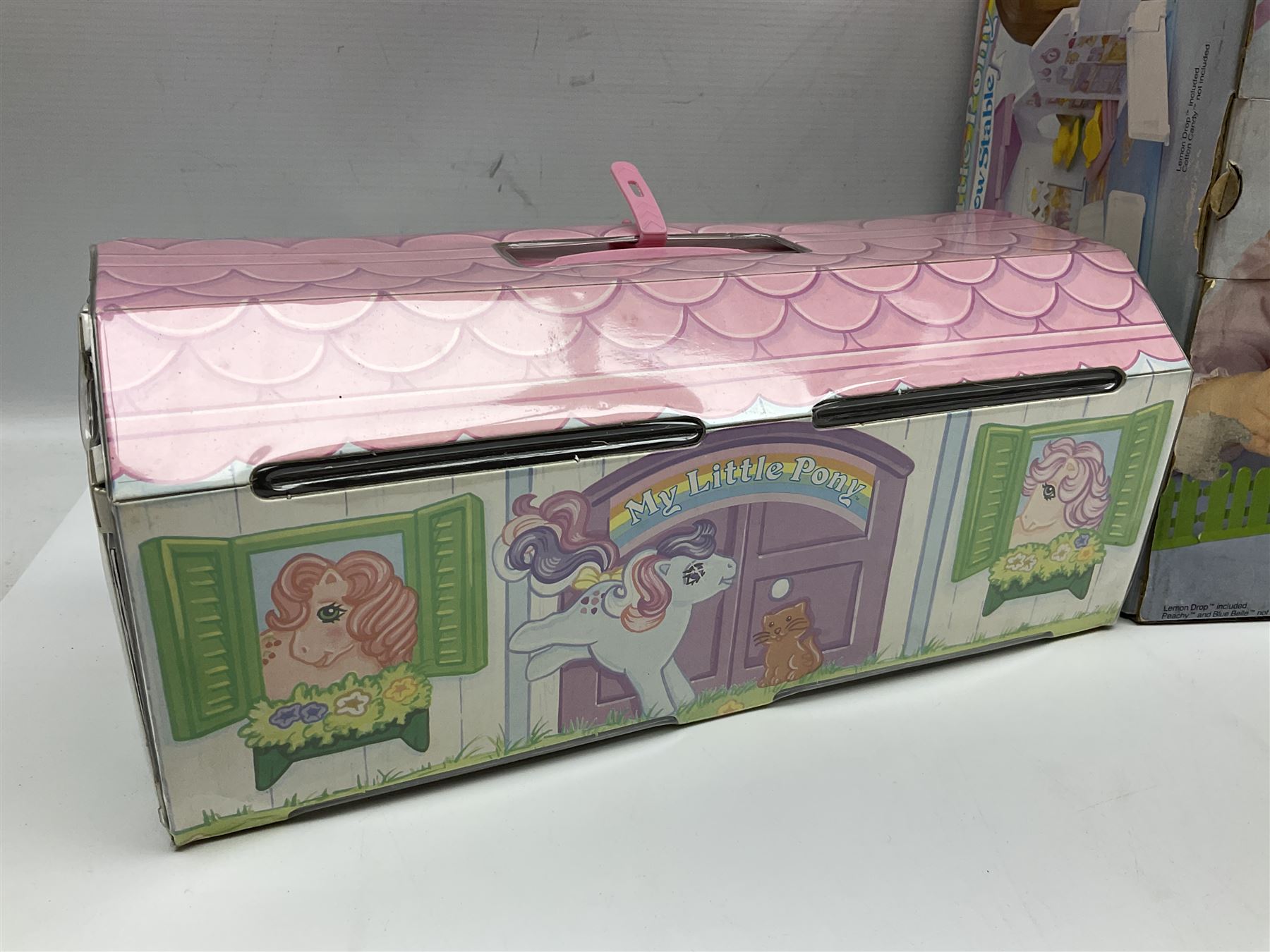1980s Hasbro My Little Pony - Dream Castle and Show Stable; both boxed, together with Lullaby Nursery and Carry Case; ten generation one ponies, including Majesty, Skydancer and Locket; and assorted accessories 