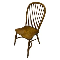 Set of six elm Windsor chairs, stick and hoop back, saddle seats with crinoline stretcher base