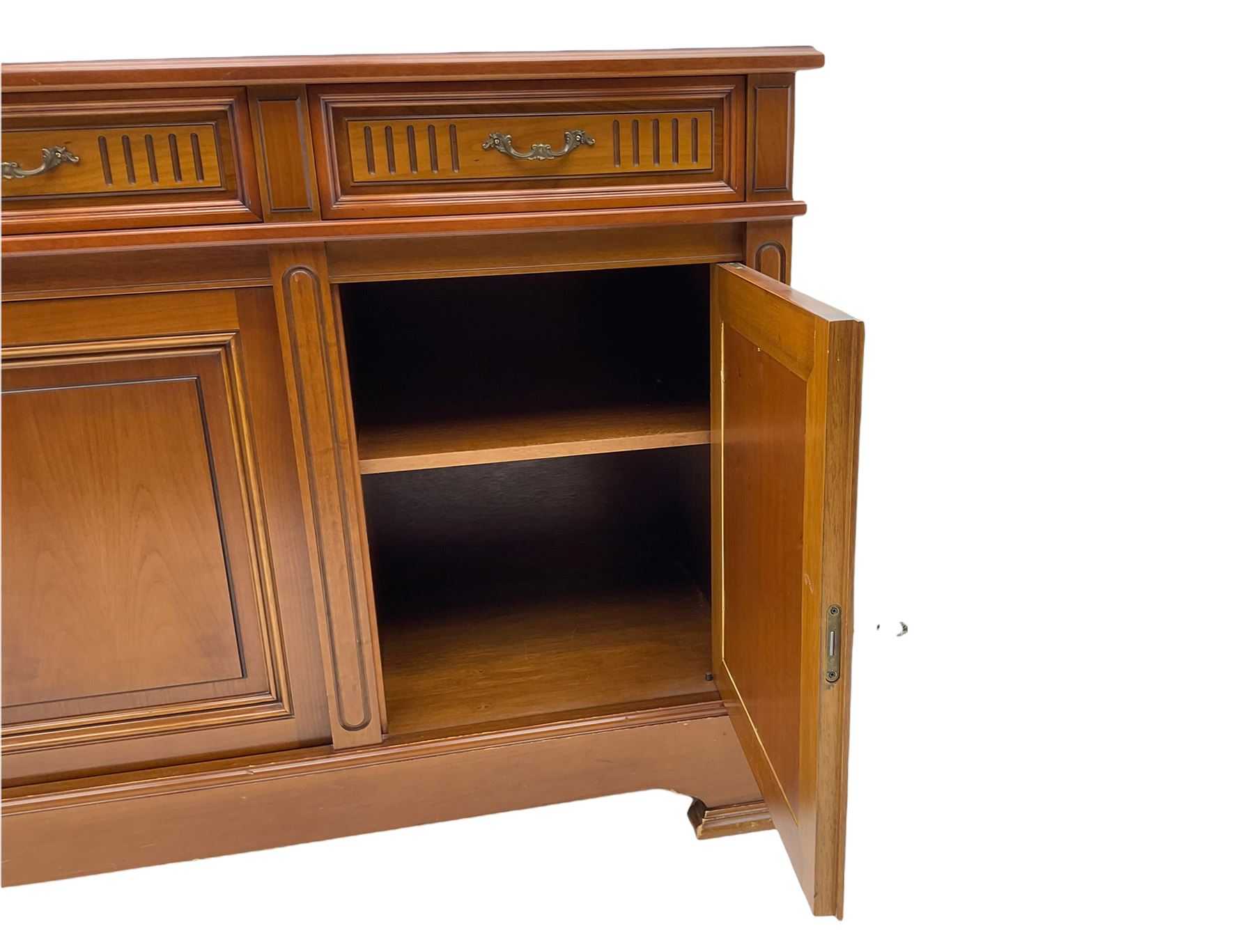 Contemporary cherry wood sideboard, rectangular moulded top over three drawers and three cupboards