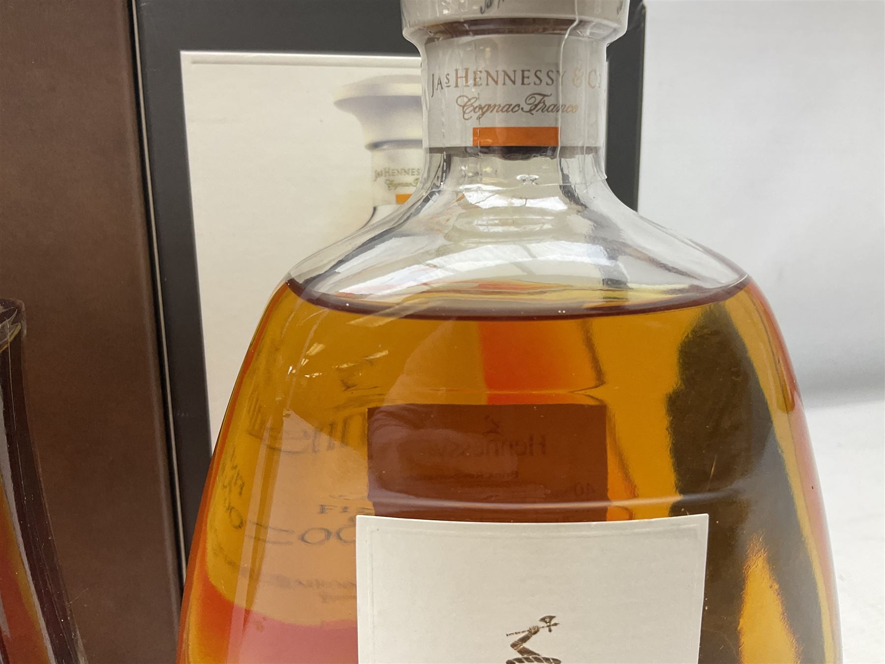 Hennessy, fine de cognac, 70cl, 40% vol, Monnet, Xo prestige cognac, 70cl, 40% proof and Hine Antique, Tres Vieille champagne cognac, 68cl, 40% vol, all with original boxes 