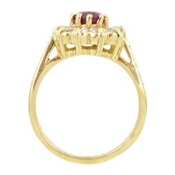 14ct gold oval cut ruby and round brilliant cut diamond cluster ring, stamped, ruby approx 0.90 carat, total diamond weight approx 0.50 carat