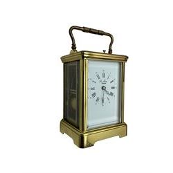 8-day French 20th century corniche carriage clock with a striking movement and repeat work, white enamel dial with Roman numerals, minute track and steel moon hands, dial inscribed St James, London. With a jewelled lever escapement, striking the hours and half hours on a coiled gong. 
