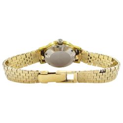 Girard-Perregaux Gyromatic gold-plated and stainless steel automatic wristwatch, champagne dial with baton hour markers and date aperture, on gold link bracelet