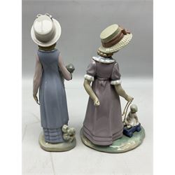Four Lladro figures, comprising Pulling Dolls Carriage no 5044, Belinda with her Doll no 5045, Pretty Pickings no 5222 and Shepherdess with basket no 4678 
