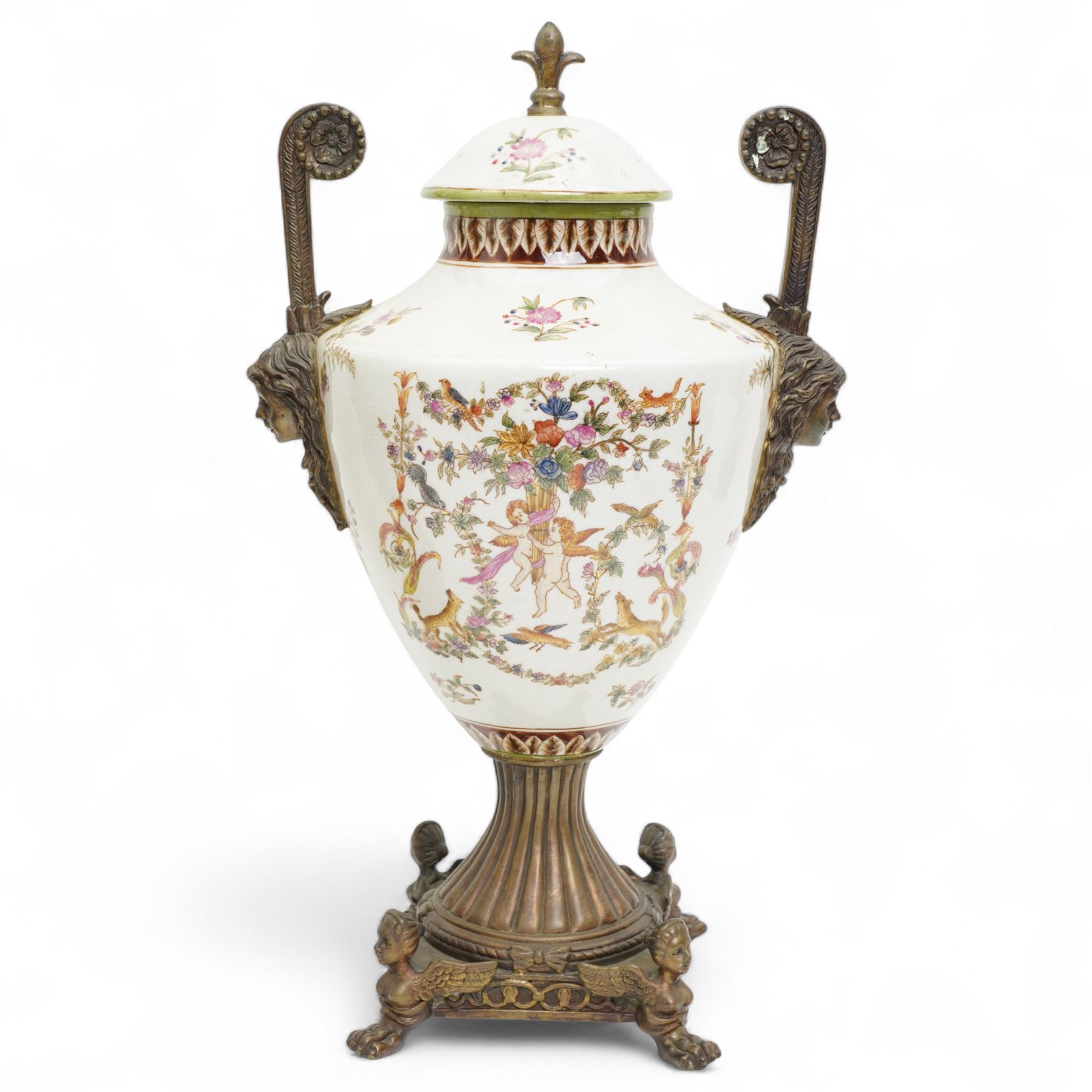Wong Lee twin handled ceramic urn, with enamelled cherubs among animals and foliate decoration with bronzed metal mounts, upon a square base with paw feet, together with similar twin handled urn with enamelled floral decoration, marked to base, largest H48cm (2)