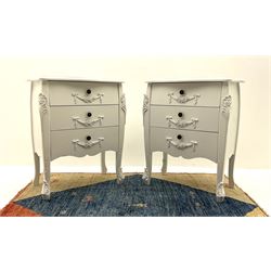 Pair of French style white painted chests fitted with three long drawers, acanthus carved shaped supports 