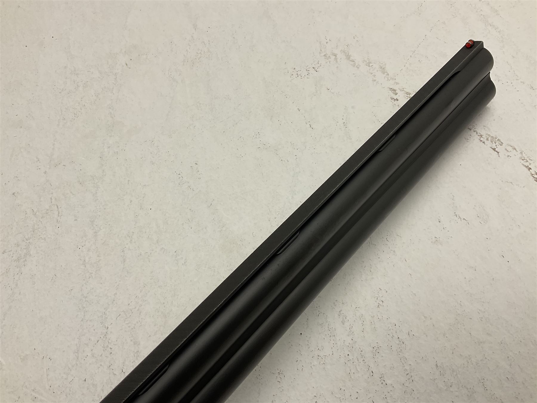 Italian Beretta Model 686 Onyx 12-bore double barrel over-and-under boxlock ejector shotgun, the 74.5cm barrels with ventilated top rib, walnut stock with chequered pistol grip and fore-end, single selective trigger Fore-end no.38044 Barrels no.5314 Action no.F38044B; together with set of five chokes (two fitted) SHOTGUN CERTIFICATE REQUIRED