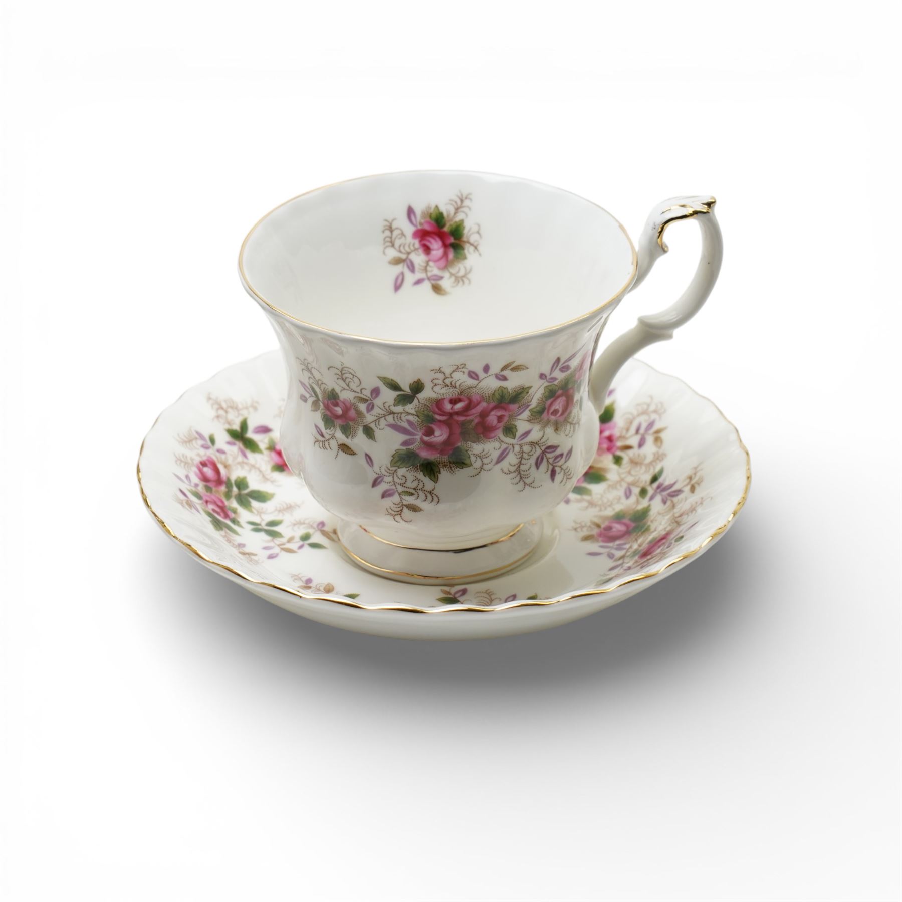 Royal Albert Lavender Rose tea and dinner wares, comprising eight dinner plates, and eight small dinner plates, eight side plates, open serving dish, teapot, open sucrier, salt and pepper, sandwich plate, sauce boat and saucer, eight teacups and saucers, six bowls, six oval serving dishes, and one platter