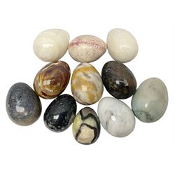Collection of approximately 11 polished hardstone and marble models of eggs, including eggs with fossil inclusions, alabaster etc