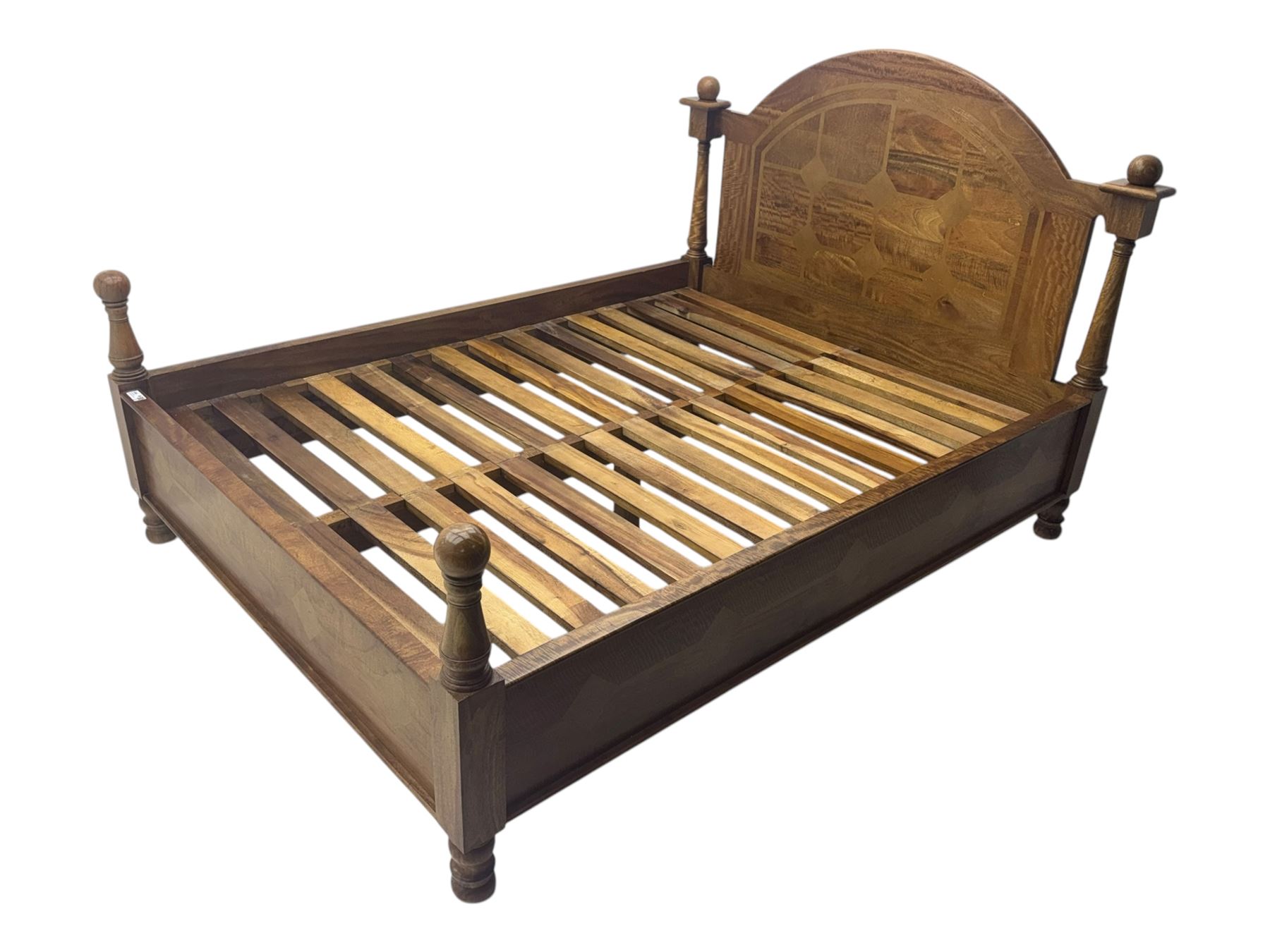 Contemporary mango wood bed frame, comprising an arched panelled headboard and footboard with inlaid geometric patterns, turned posts with spherical finials, and complete with side rails and slatted base