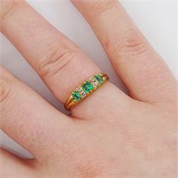 Edwardian 18ct gold three stone emerald and four stone old cut diamond ring, Chester 1905