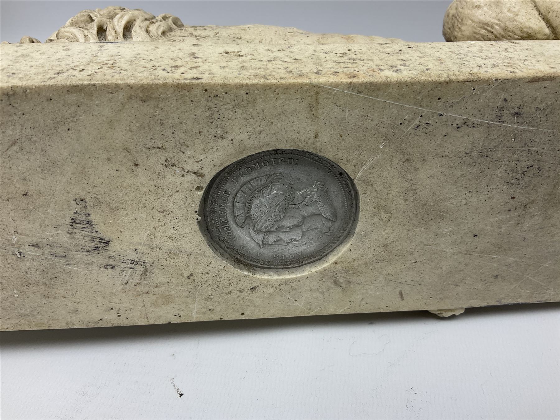 Two early 20th century reconstituted stone Grand Tour or Chatsworth House type lions after Antonio Canova, each modelled in recumbent pose upon a rectangular plinth, signed to plinth Dilettanti, each approximately L31cm