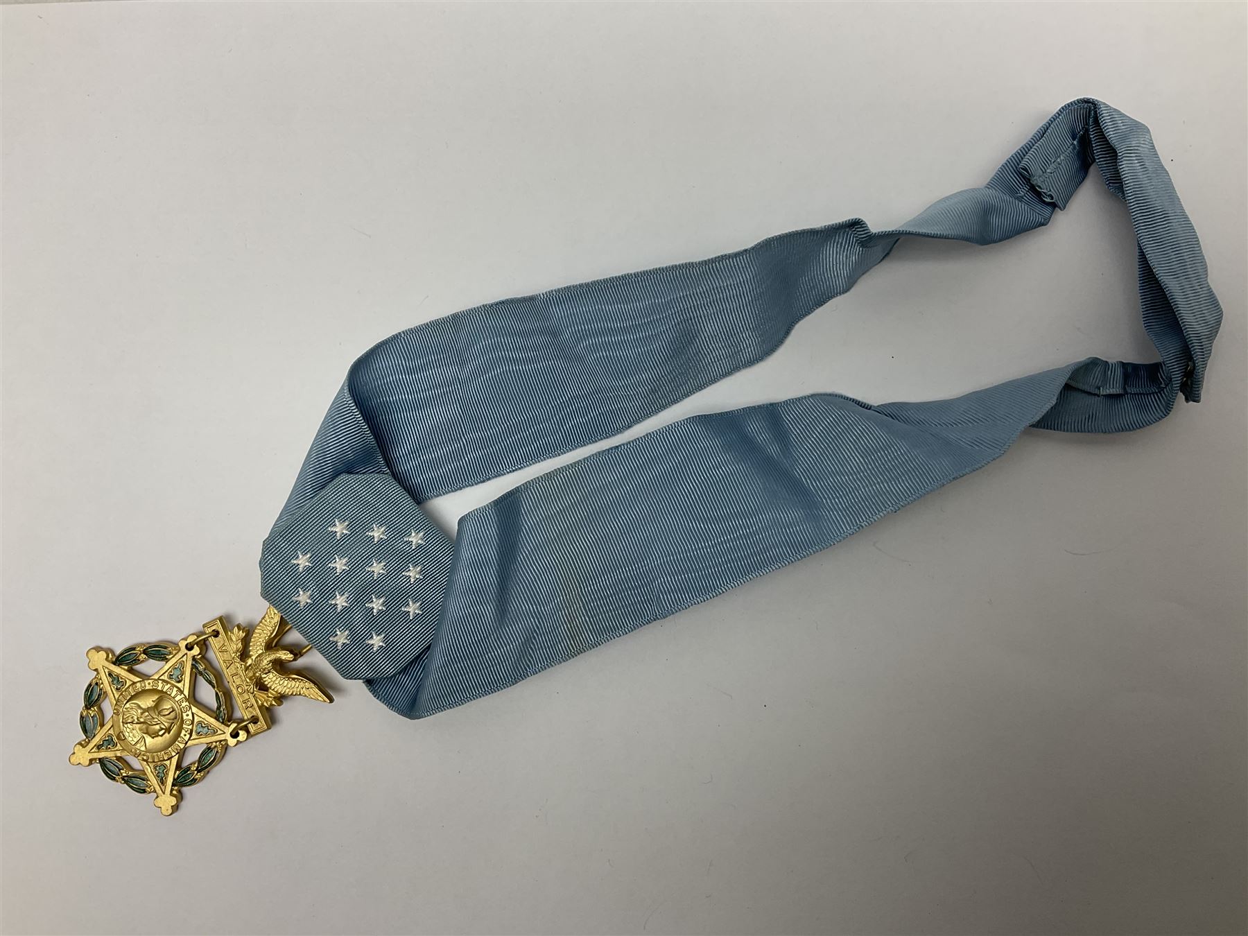 United States of America, Congressional Medal of Honor, gilt metal and enamel, unnamed, reverse of suspension engraved ‘The Congress to’, the neck cravat with pop stud attachments, boxed with felt bag