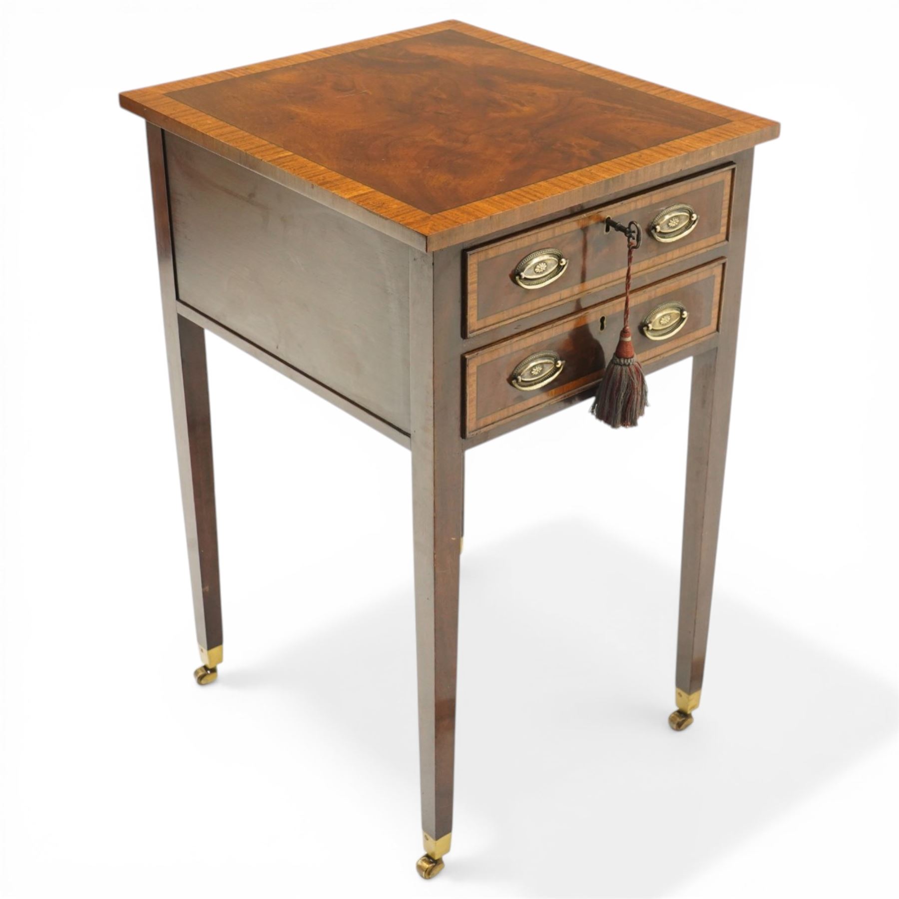 Georgian design inlaid mahogany collectors table, rectangular cross-banded top, fitted with two cock-beaded display drawers with interior glazed tops, with opposing faux drawers, fitted with pressed brass handle plates, on square tapering supports with castors, with keys