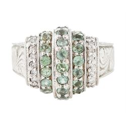 14ct white gold alexandrite and diamond stepped design ring, three rows of round cut alexa...