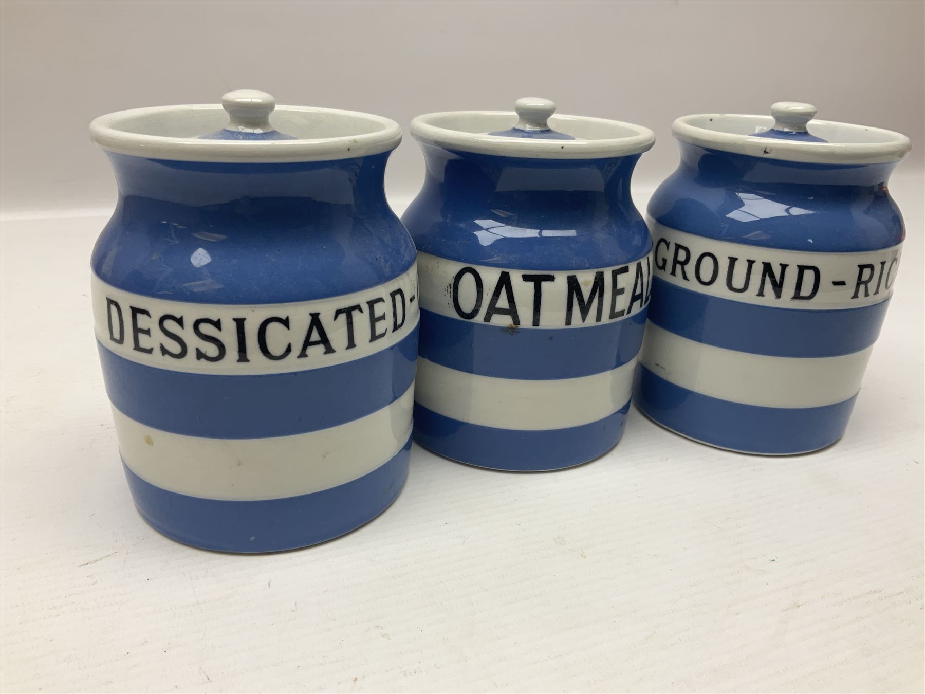 Three T.G Green Cornishware jars, H12cm